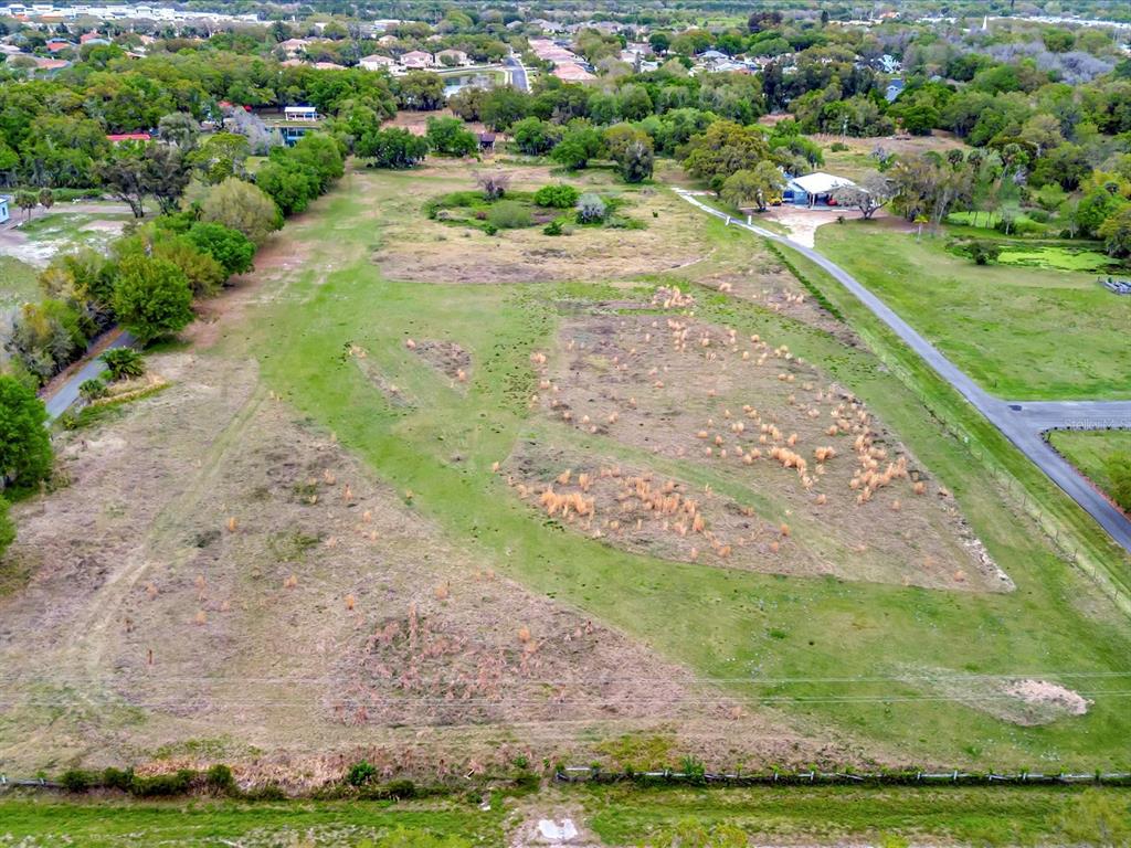 9120 25th Street East Parrish, FL 34219 - Photo 23 of 28 a view of a street with a houses