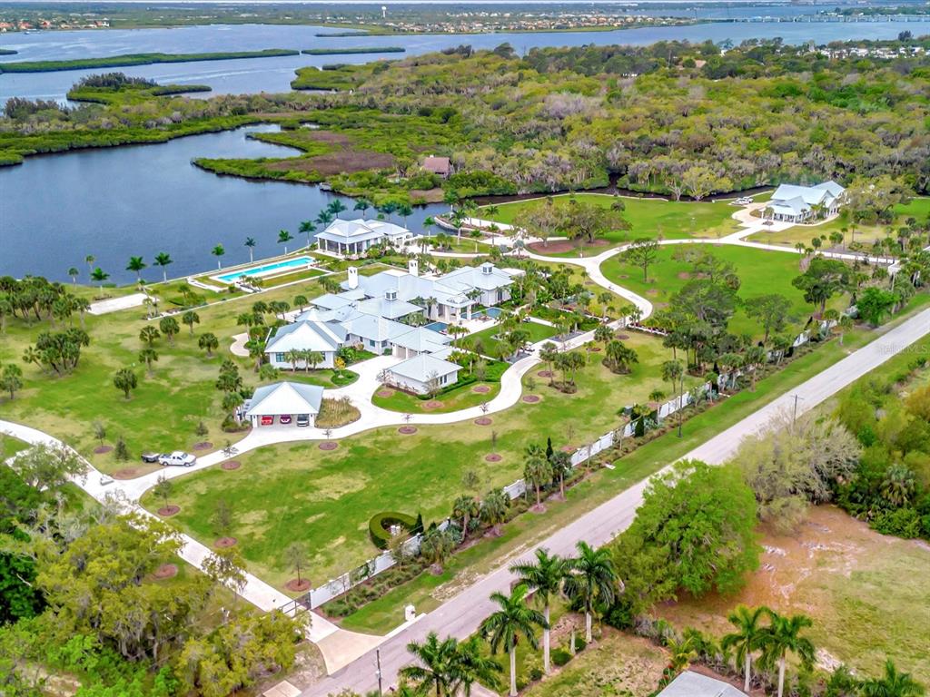 9120 25th Street East Parrish, FL 34219 - Photo 26 of 28 a view of a lake with a big yard