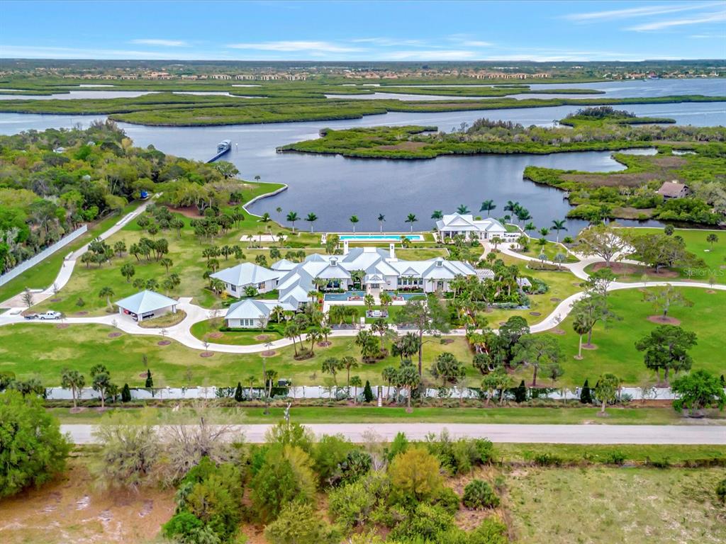 9120 25th Street East Parrish, FL 34219 - Photo 27 of 28 a view of a lake with a big yard