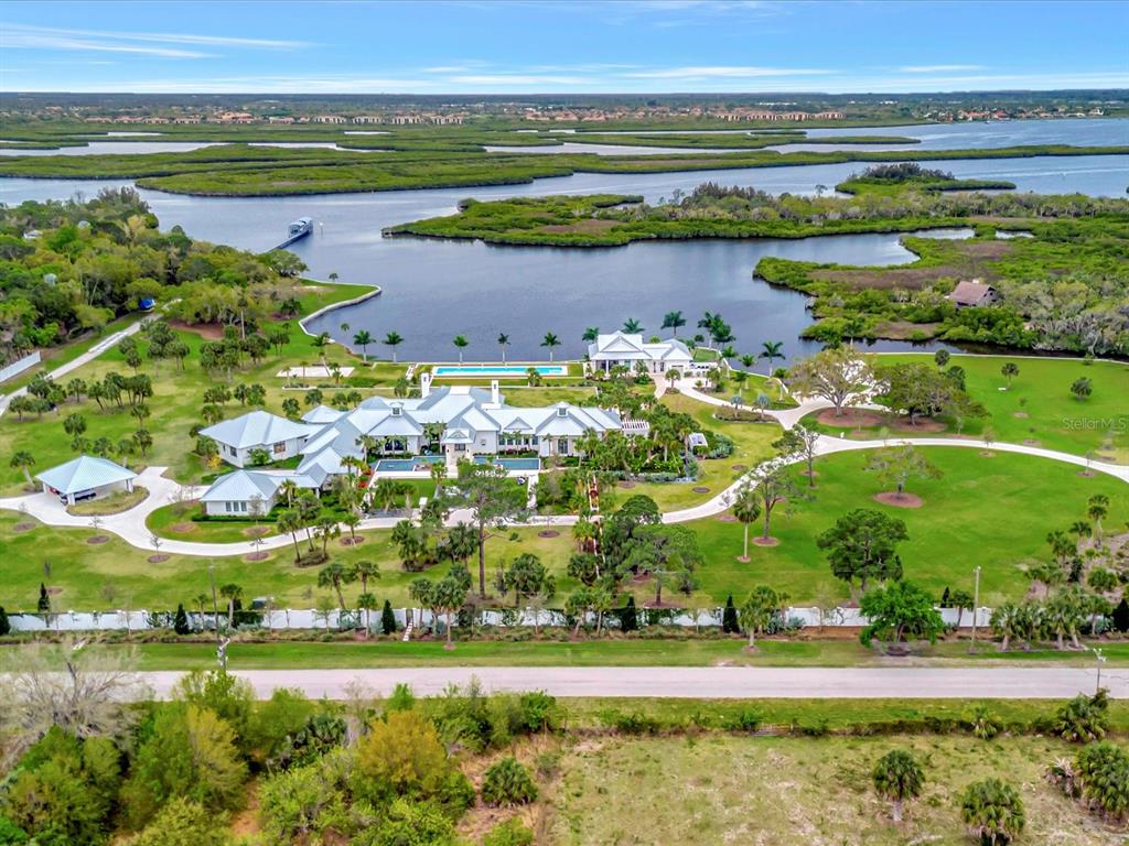 9120 25th Street East Parrish, FL 34219 - Photo 28 of 28 a view of a lake with a big yard