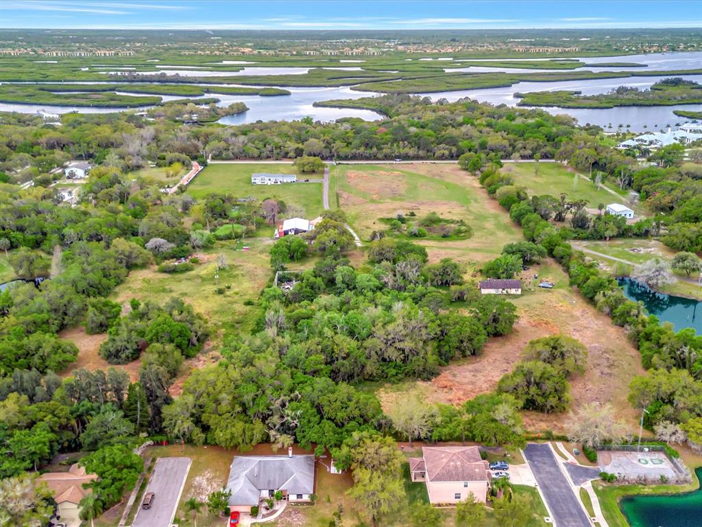 9120 25th Street East Parrish, FL 34219 - Photo 6 of 28 a view of an ocean and beach