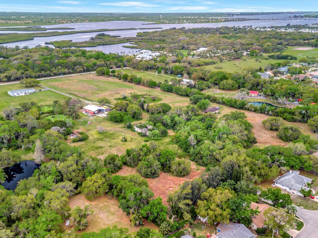 9120 25th Street East Parrish, FL 34219 - Photo 7 of 28 a view of a lush green field