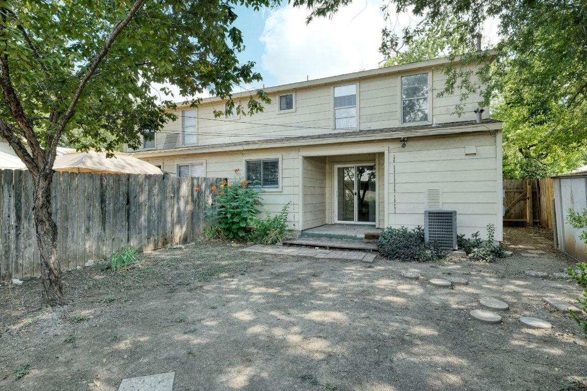 2711 St Edwards Circle, Unit 2 Austin, TX 78704 - Photo 13 of 17 Rear view of property featuring a fenced backyard