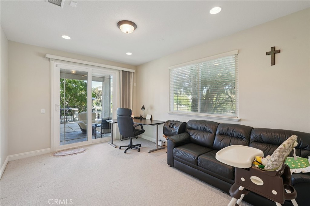 30810 Avenida Del Reposo Temecula, CA 92591 - Photo 17 of 75 a living room with furniture and a large window