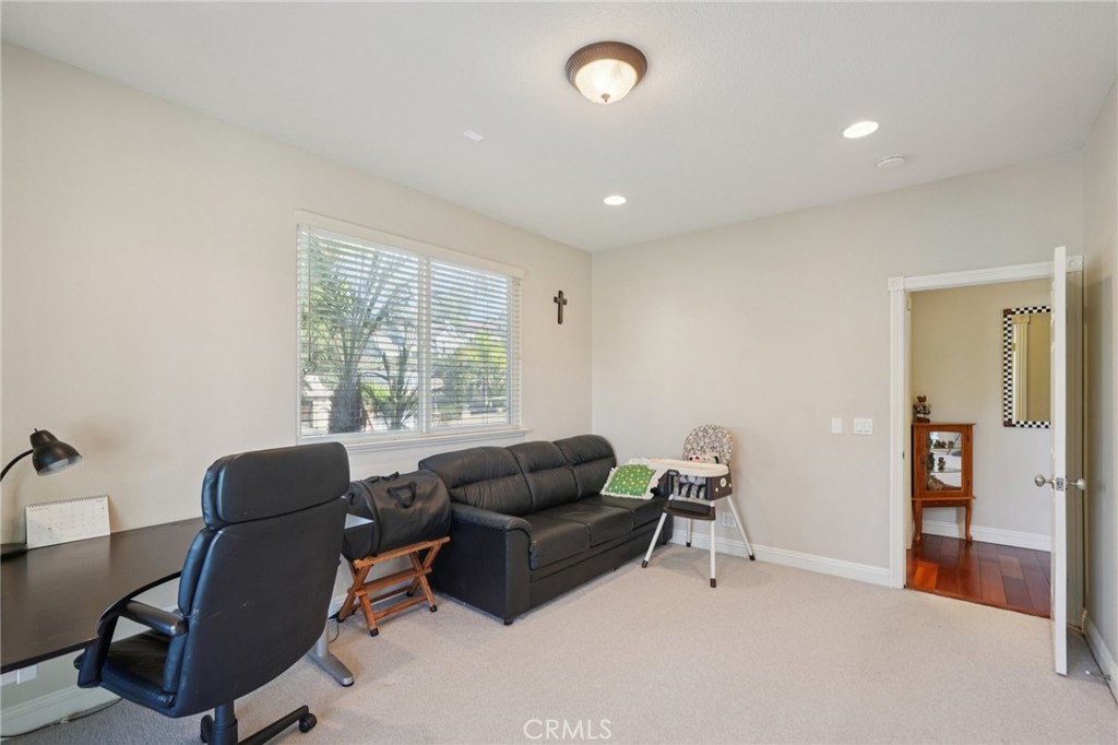 30810 Avenida Del Reposo Temecula, CA 92591 - Photo 18 of 75 a living room with furniture and a window