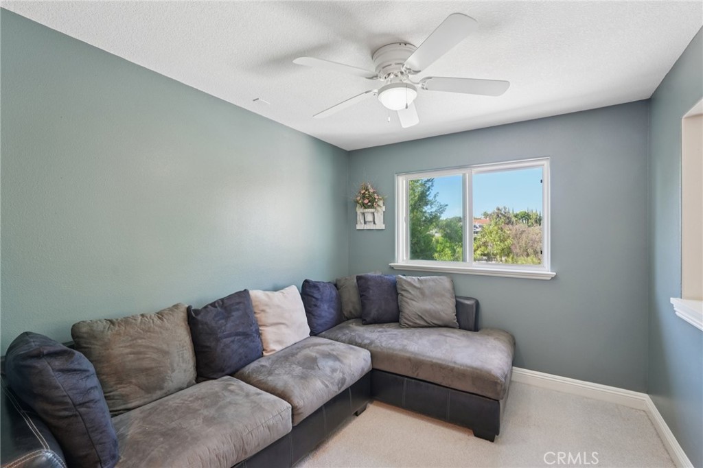 30810 Avenida Del Reposo Temecula, CA 92591 - Photo 19 of 75 a living room with furniture and a large window