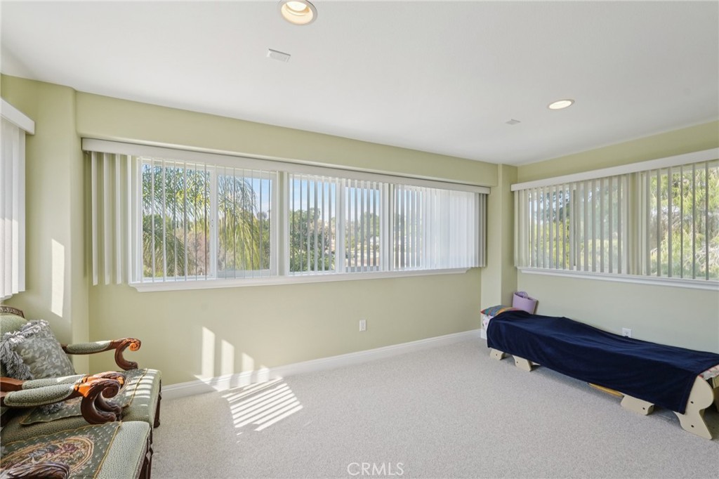 30810 Avenida Del Reposo Temecula, CA 92591 - Photo 29 of 75 a living room with furniture and a window