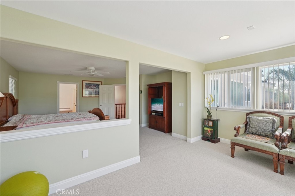 30810 Avenida Del Reposo Temecula, CA 92591 - Photo 32 of 75 a living room with furniture and a window