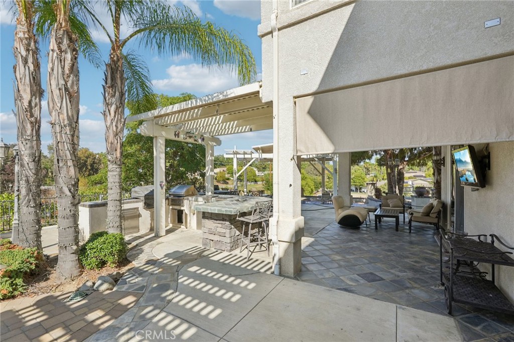 30810 Avenida Del Reposo Temecula, CA 92591 - Photo 36 of 75 a view of outdoor space yard deck patio and swimming pool