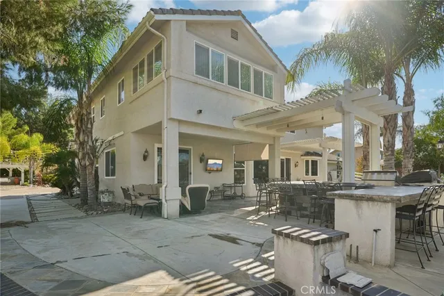 a front view of a house with a patio
