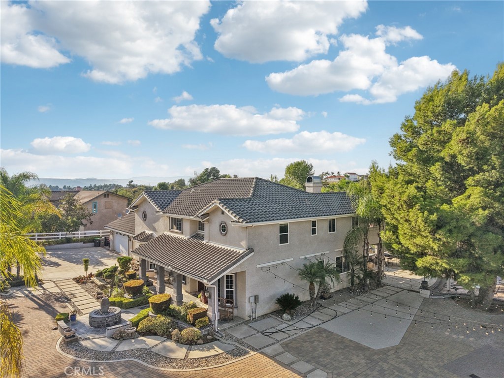 30810 Avenida Del Reposo Temecula, CA 92591 - Photo 50 of 75 an aerial view of a house with a yard and balcony