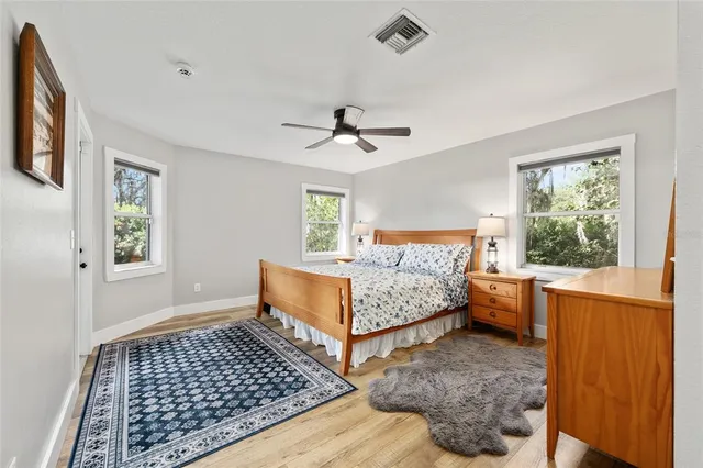 a bed room with a bed and a window