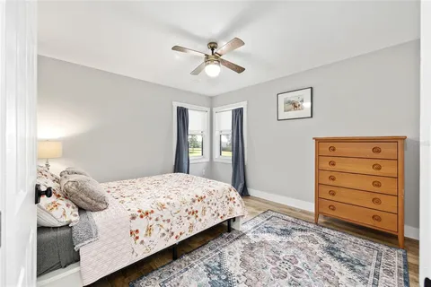 a bedroom with a bed and a dresser