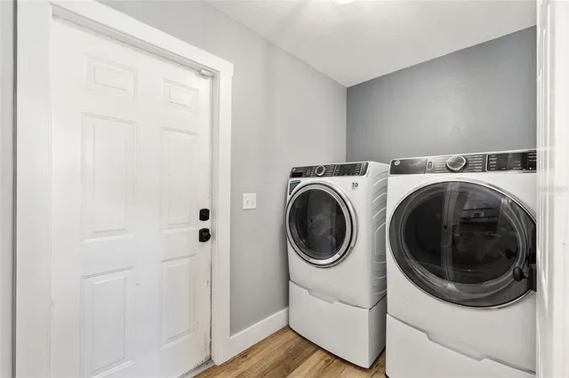 a utility room with dryer and washer