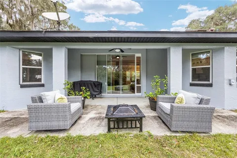 a backyard of a house with lots of green space