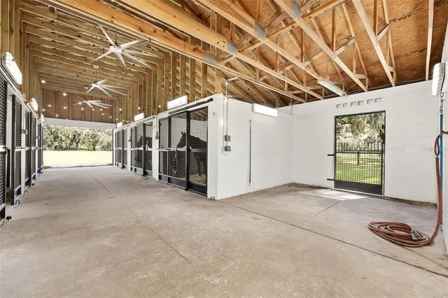a view of a livingroom with furniture and a flat screen tv