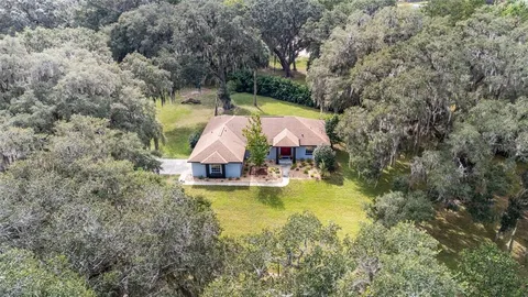 a view of a swimming pool with a lake view