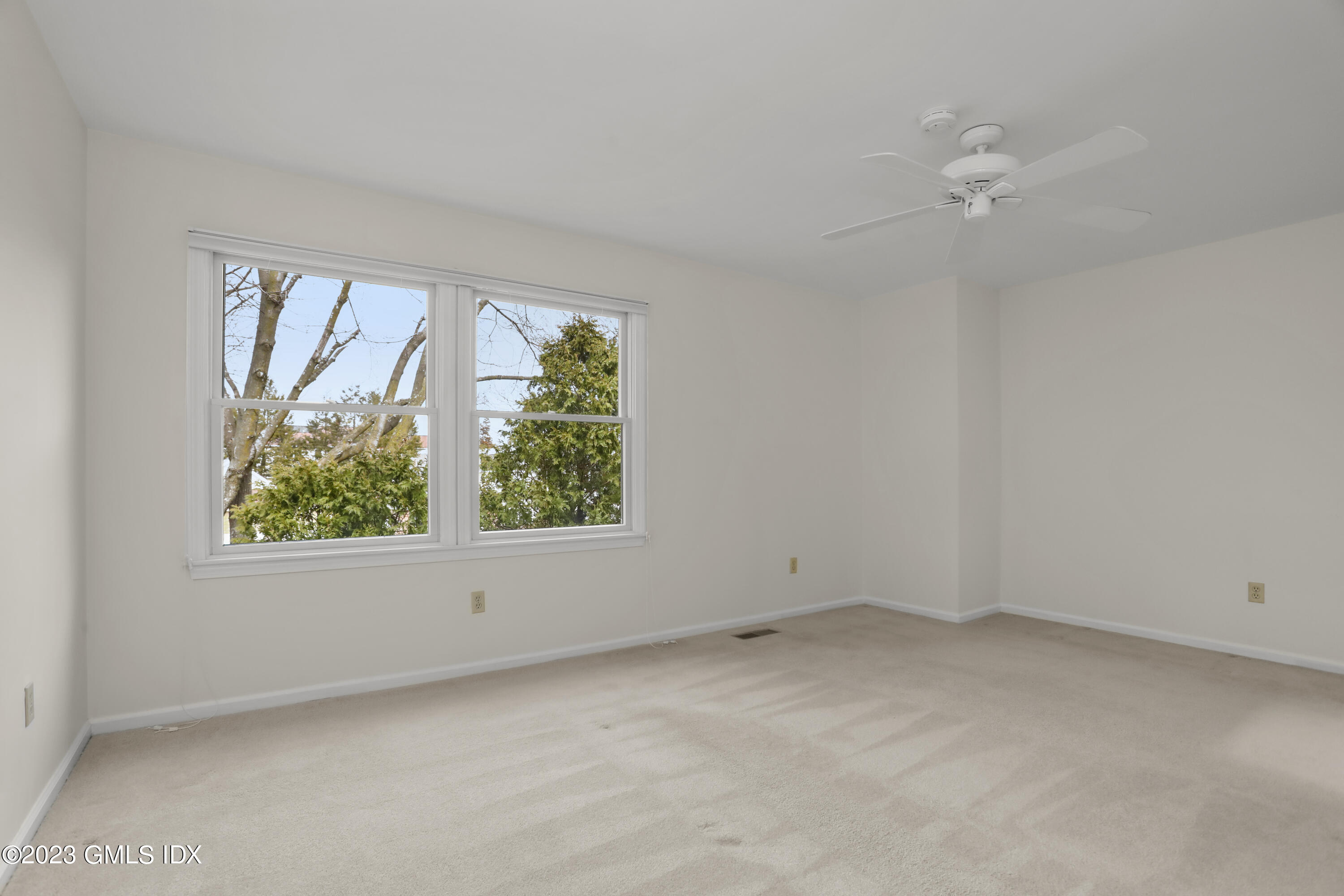 5 Glen Street, Unit 101 Greenwich, CT 06830 - Photo 13 of 37 an empty room with a window