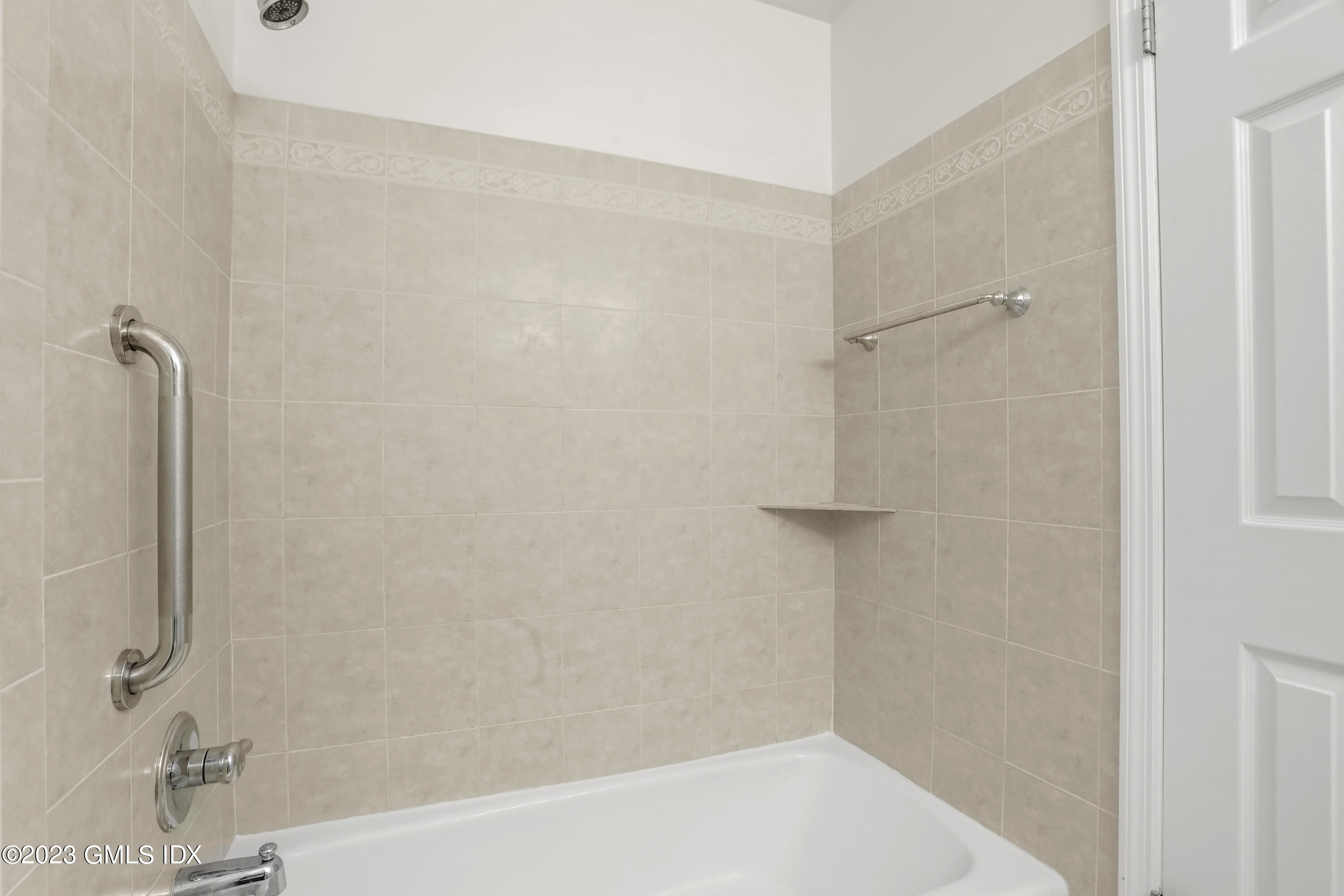 5 Glen Street, Unit 101 Greenwich, CT 06830 - Photo 20 of 37 a bathroom with a shower