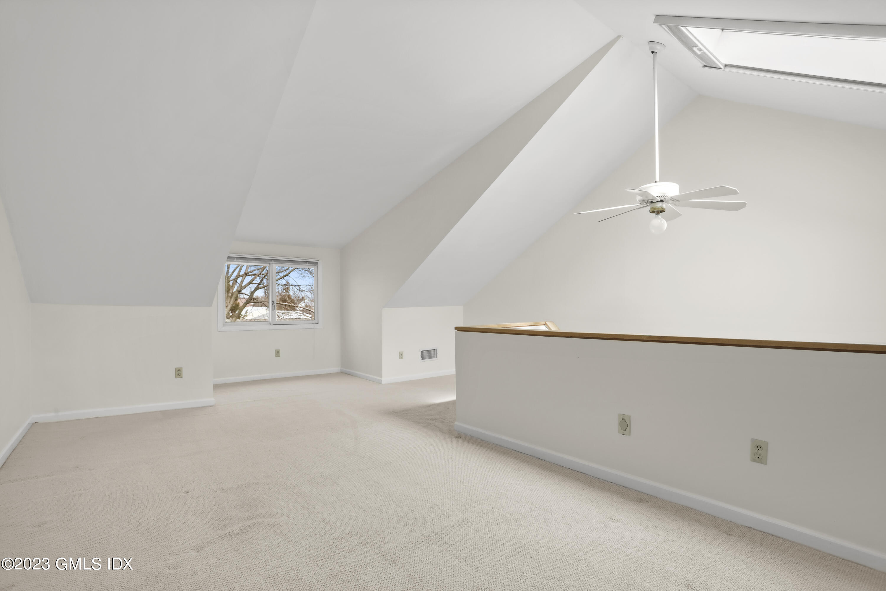 5 Glen Street, Unit 101 Greenwich, CT 06830 - Photo 22 of 37 an empty room with windows