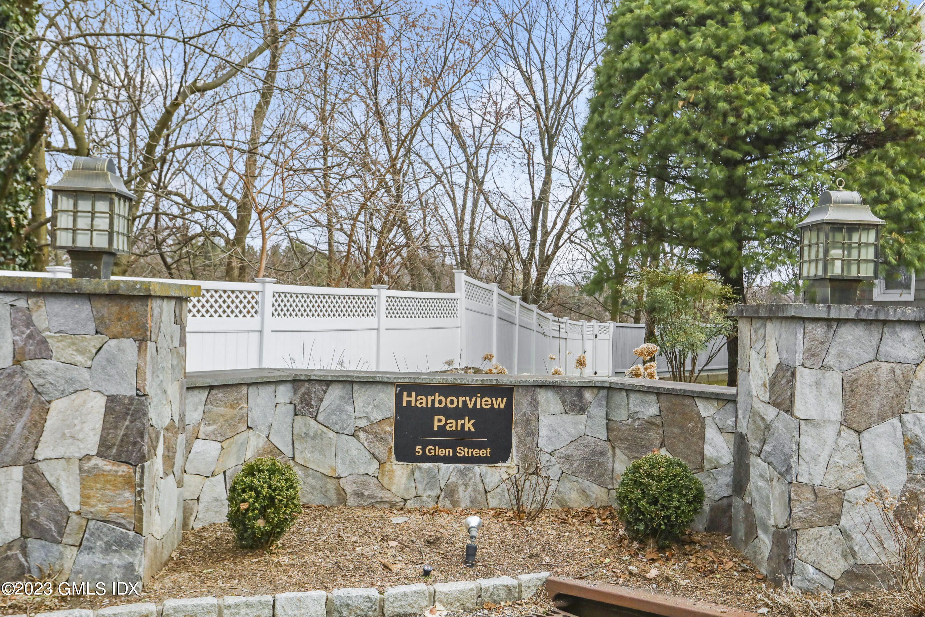 5 Glen Street, Unit 101 Greenwich, CT 06830 - Photo 32 of 37 a sign on the side of a building