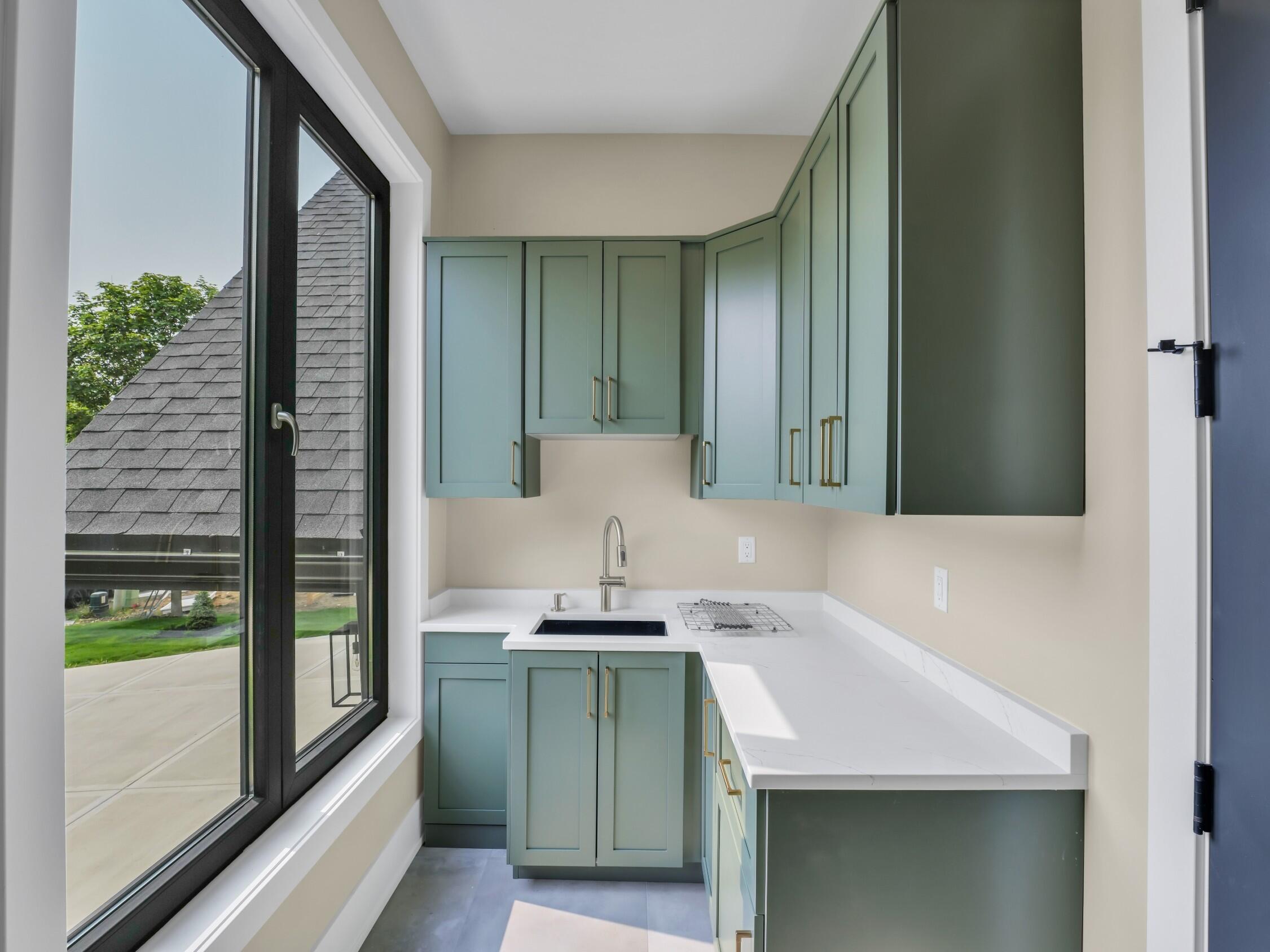 525 Maple Street Lake Geneva, WI 53147 - Photo 26 of 70 Laundry room counter with sink
