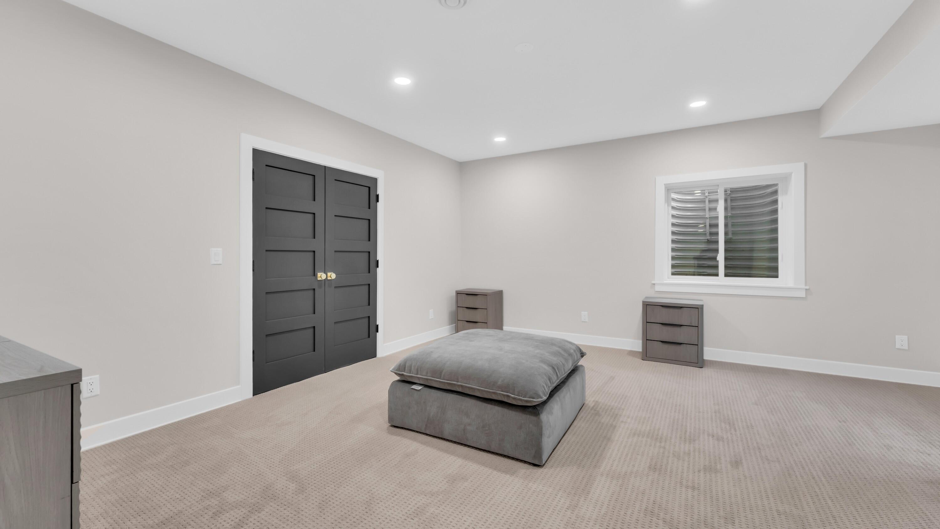 525 Maple Street Lake Geneva, WI 53147 - Photo 62 of 70 Adjacent to the lower family room is this 5th bedroom with spacious closet.