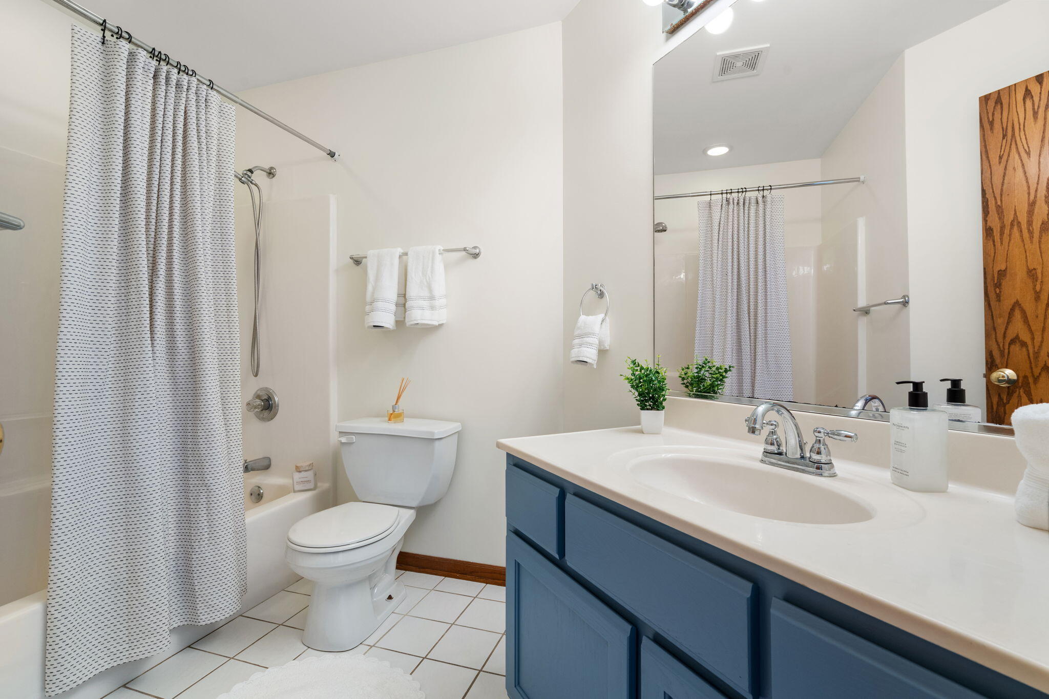 1995 Texas Street Chesterton, IN 46304 - Photo 13 of 28 a bathroom with a sink toilet and shower