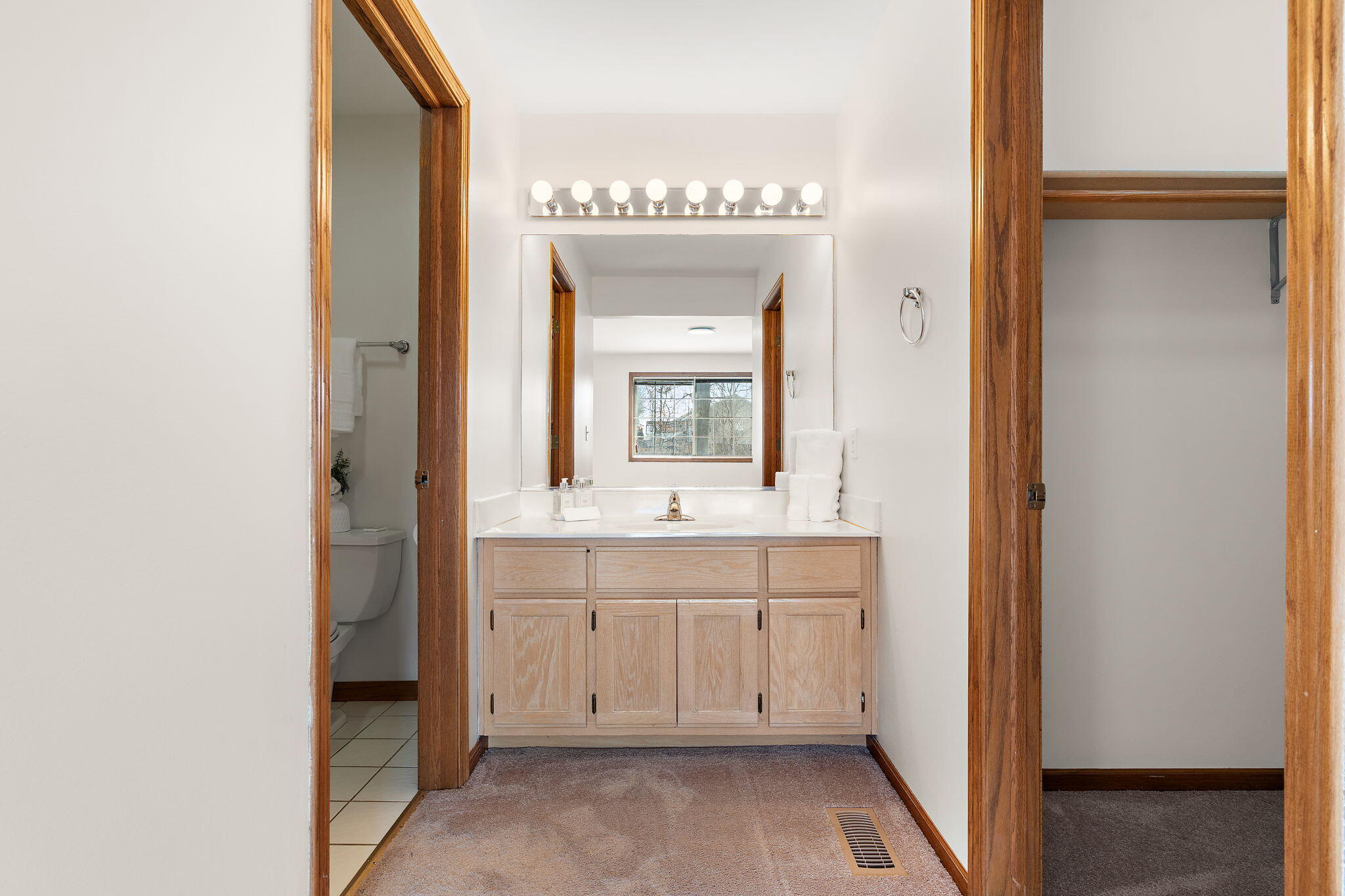 1995 Texas Street Chesterton, IN 46304 - Photo 16 of 28 a bathroom with a sink a mirror and a bathtub