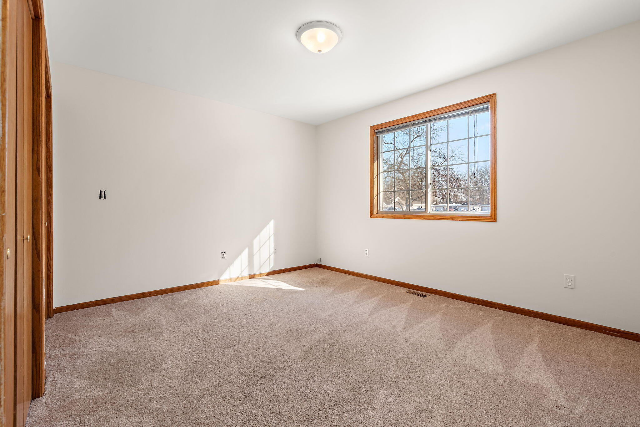 1995 Texas Street Chesterton, IN 46304 - Photo 19 of 28 an empty room with windows