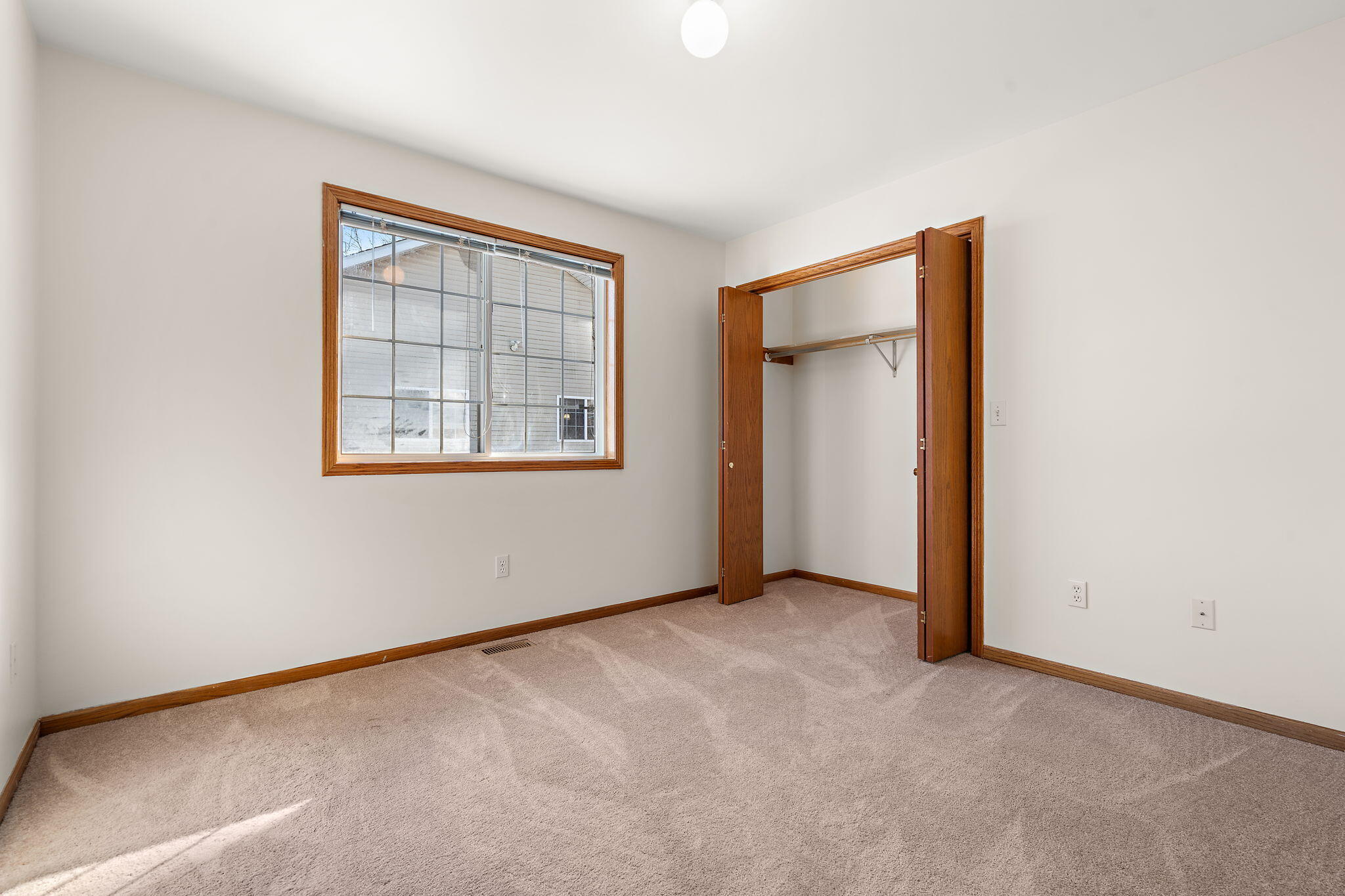 1995 Texas Street Chesterton, IN 46304 - Photo 20 of 28 an empty room with windows and closet