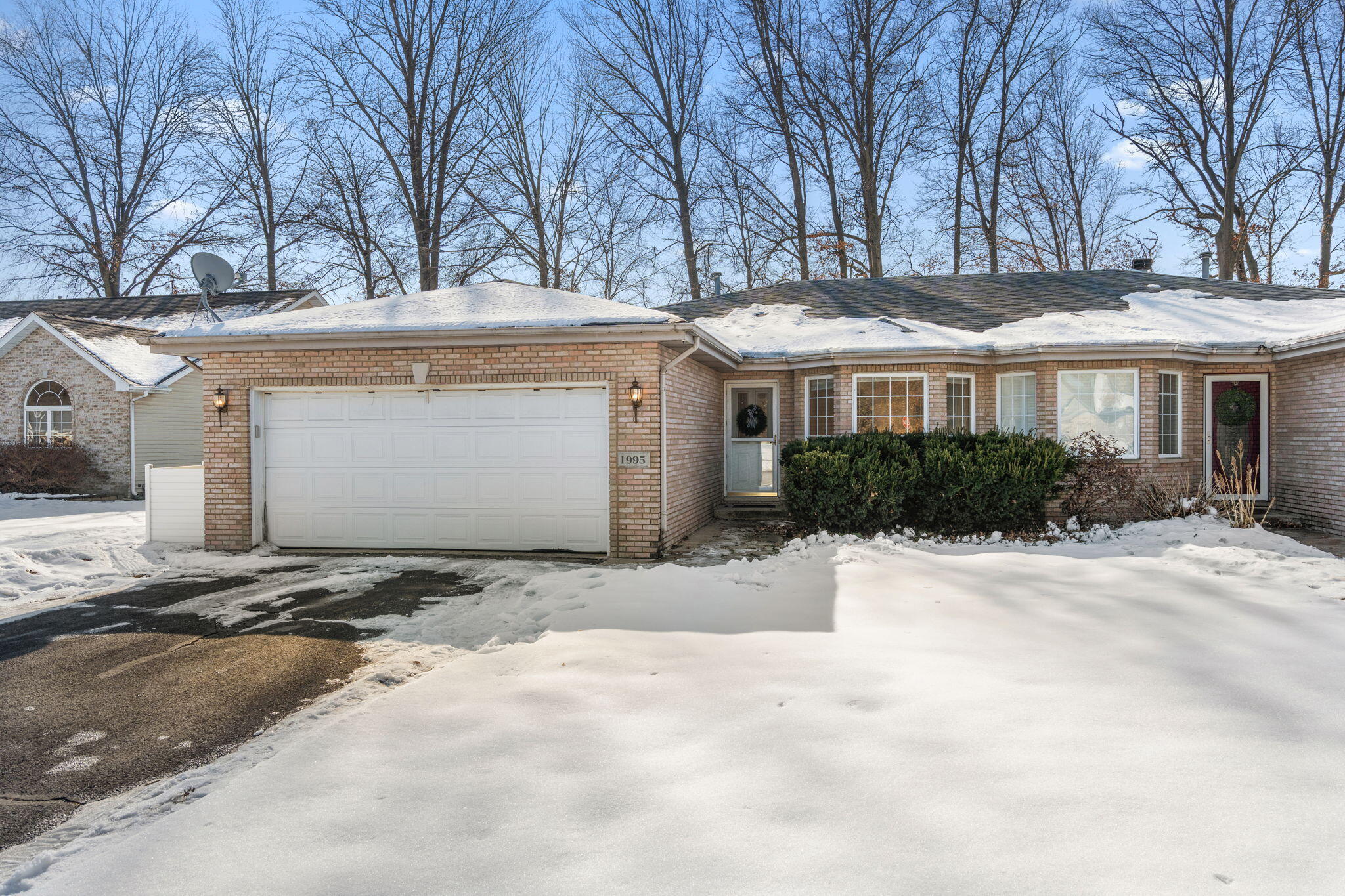 1995 Texas Street Chesterton, IN 46304 - Photo 27 of 28 a view of white house with a yard and plants