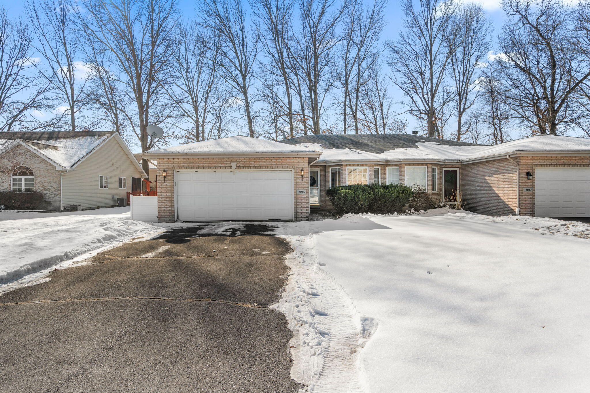 1995 Texas Street Chesterton, IN 46304 - Photo 28 of 28 a view of a white house with a snow on the road