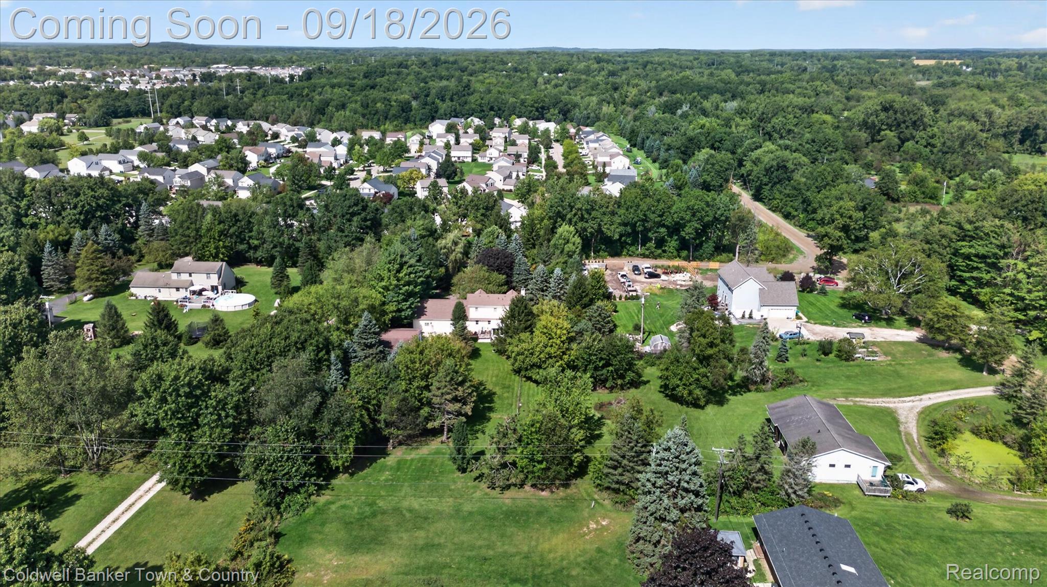 4442 McGunn Road Howell, MI 48843 - Photo 58 of 63 Expansive residential area featuring numerous homes set amidst mature trees and green spaces