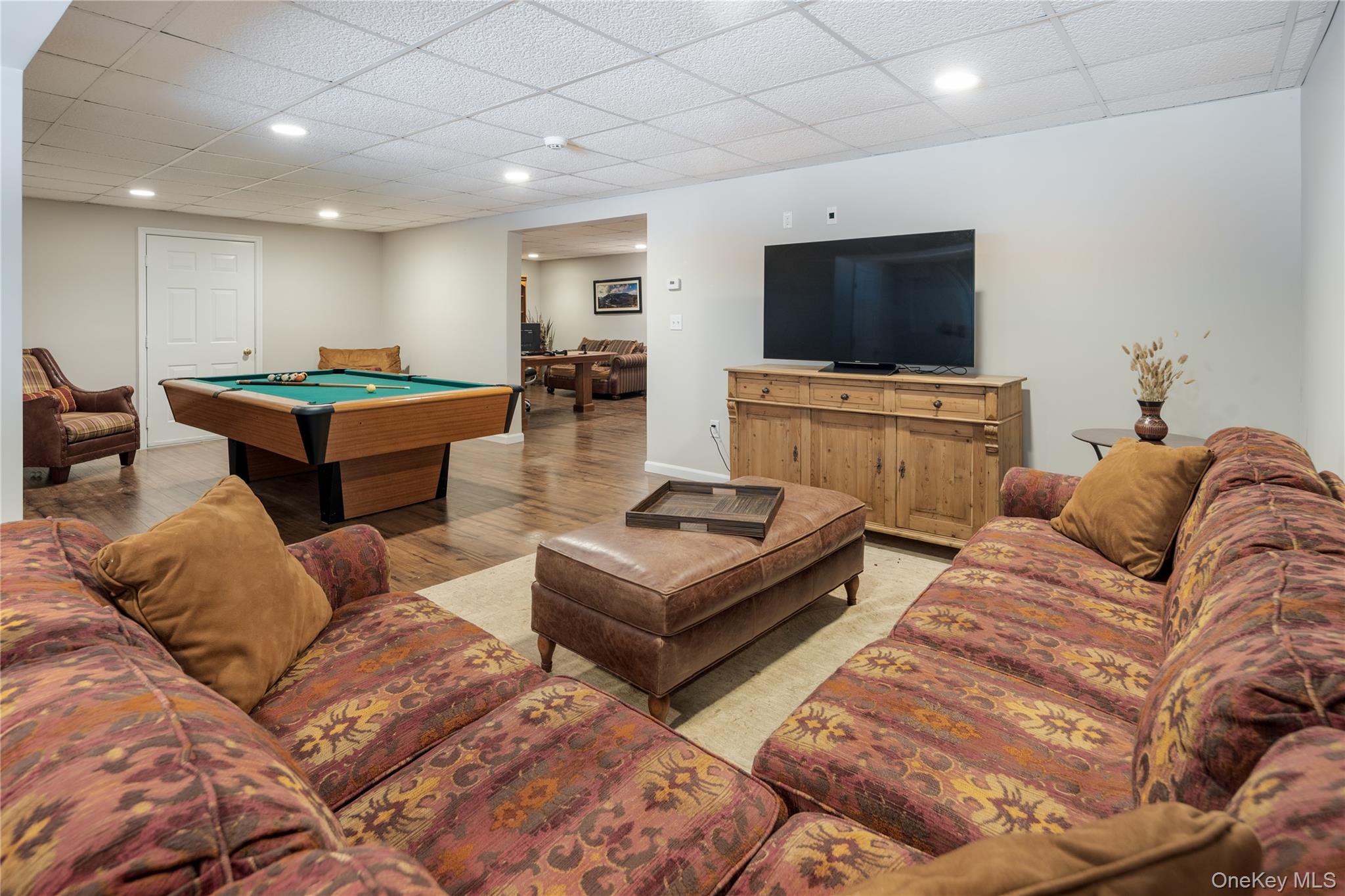14 Adams Farm Road Katonah, NY 10536 - Photo 41 of 47 Large lower level recreation room with easy care laminate flooring and door out