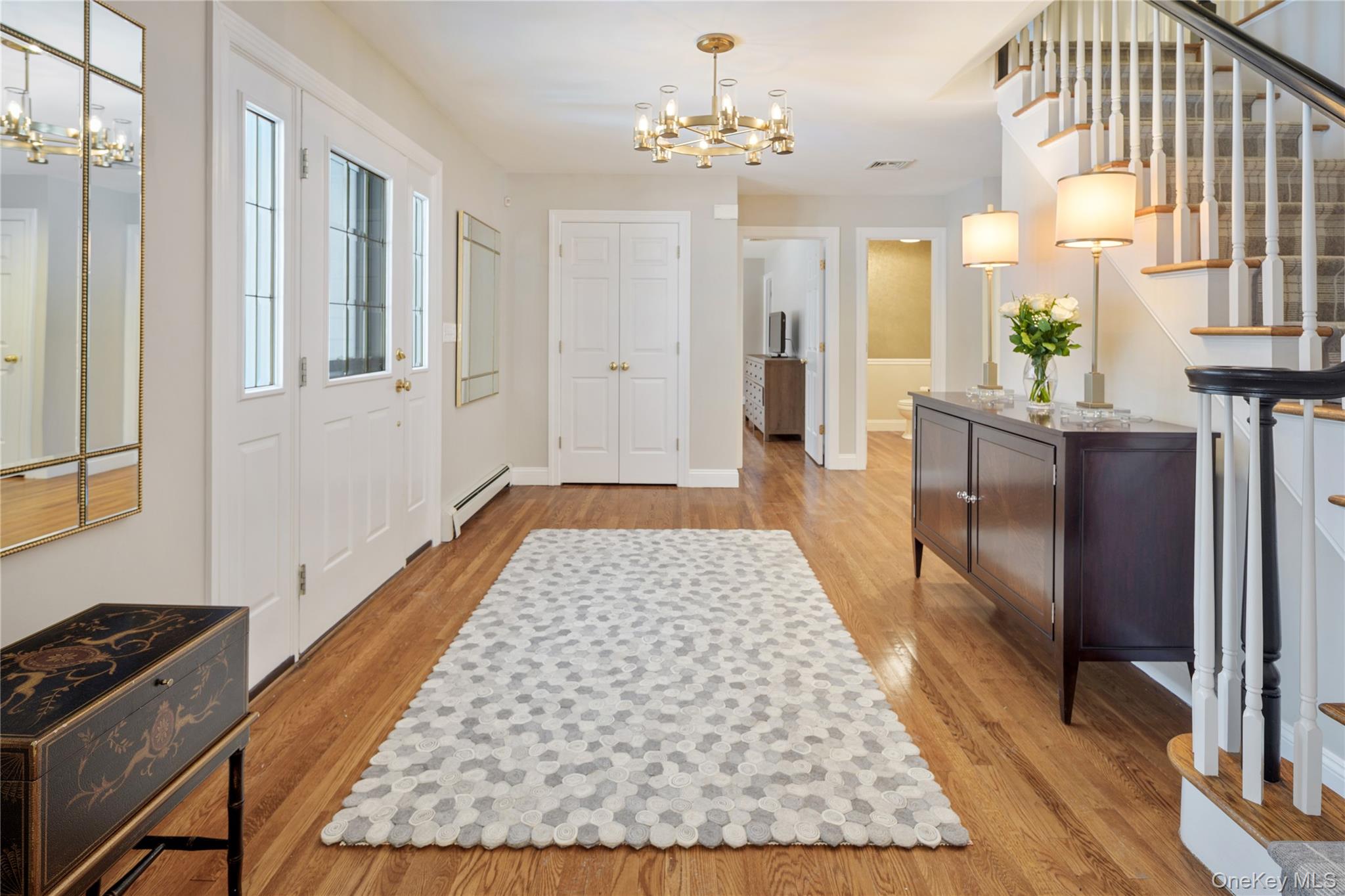 14 Adams Farm Road Katonah, NY 10536 - Photo 10 of 47 Gracious entry hall with double coat closet, oak hardwood floors