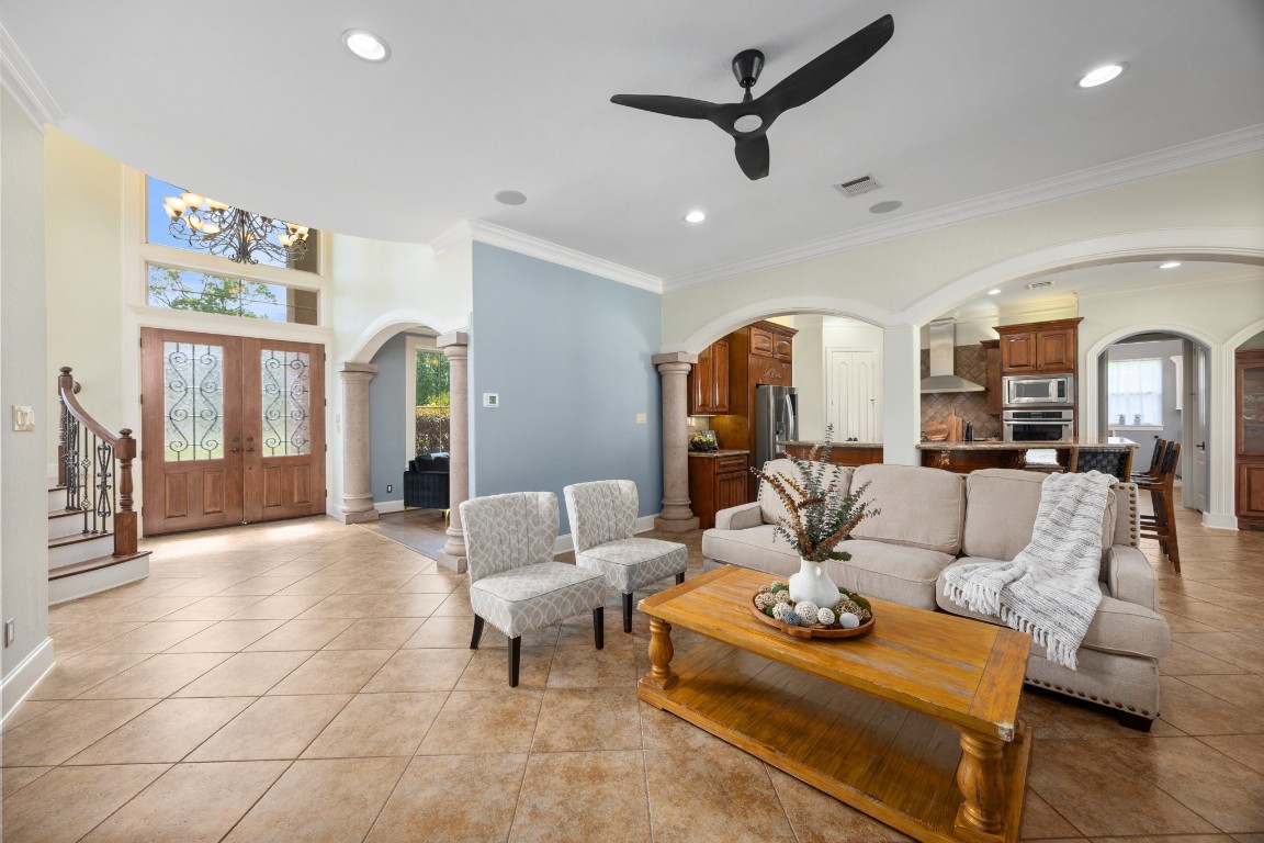 4447 Chateau Creek Way Spring, TX 77386 - Photo 12 of 50 a living room with furniture and wooden floor