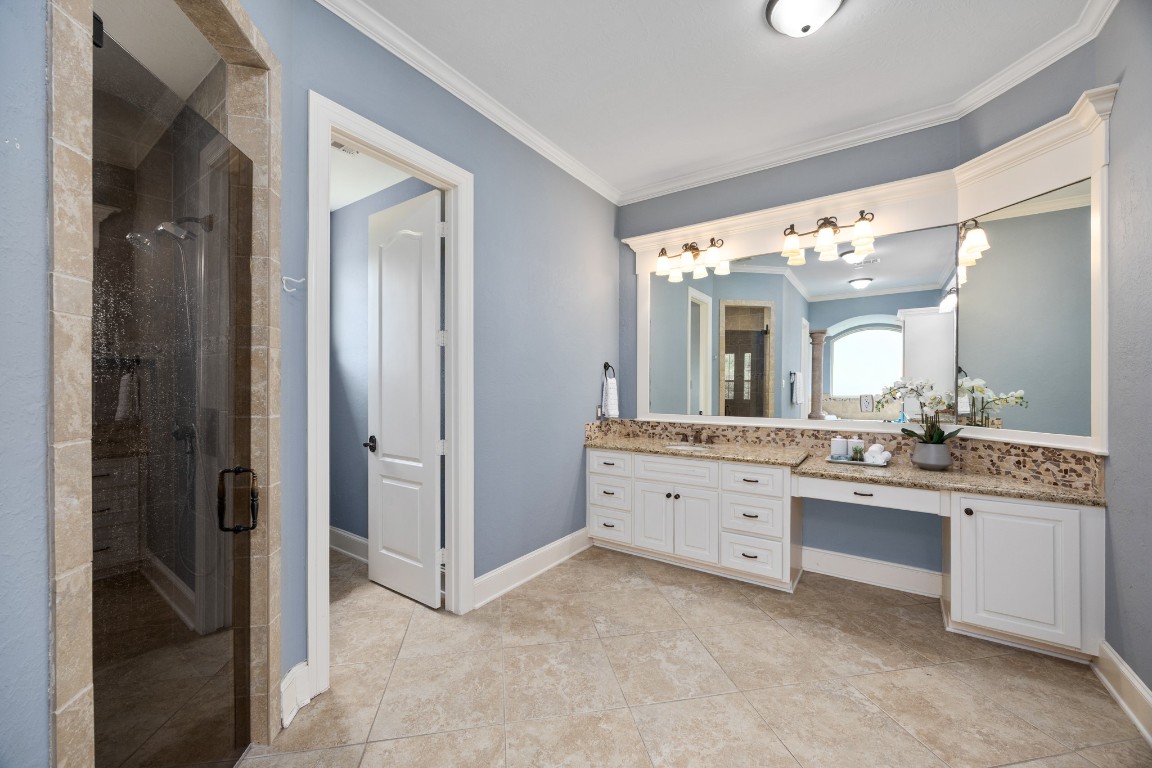4447 Chateau Creek Way Spring, TX 77386 - Photo 20 of 50 a bathroom with a granite countertop sink mirror and a