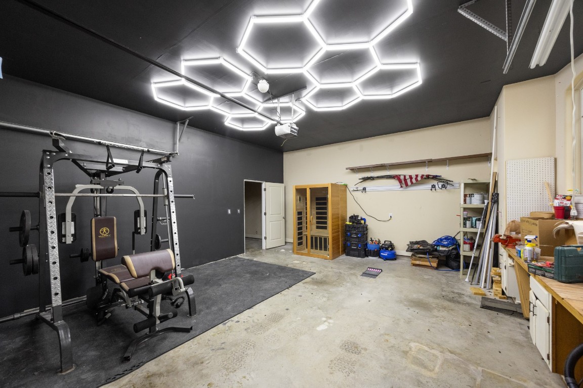 4447 Chateau Creek Way Spring, TX 77386 - Photo 49 of 50 a view of a room with gym equipment