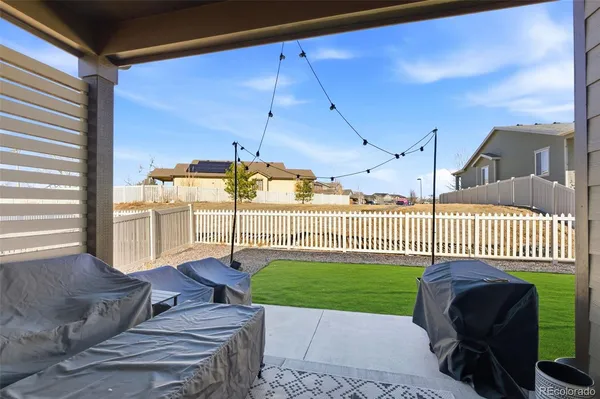a garden view with a sitting space