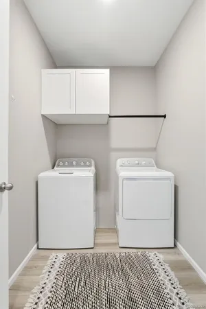 a utility room with a washer and dryer