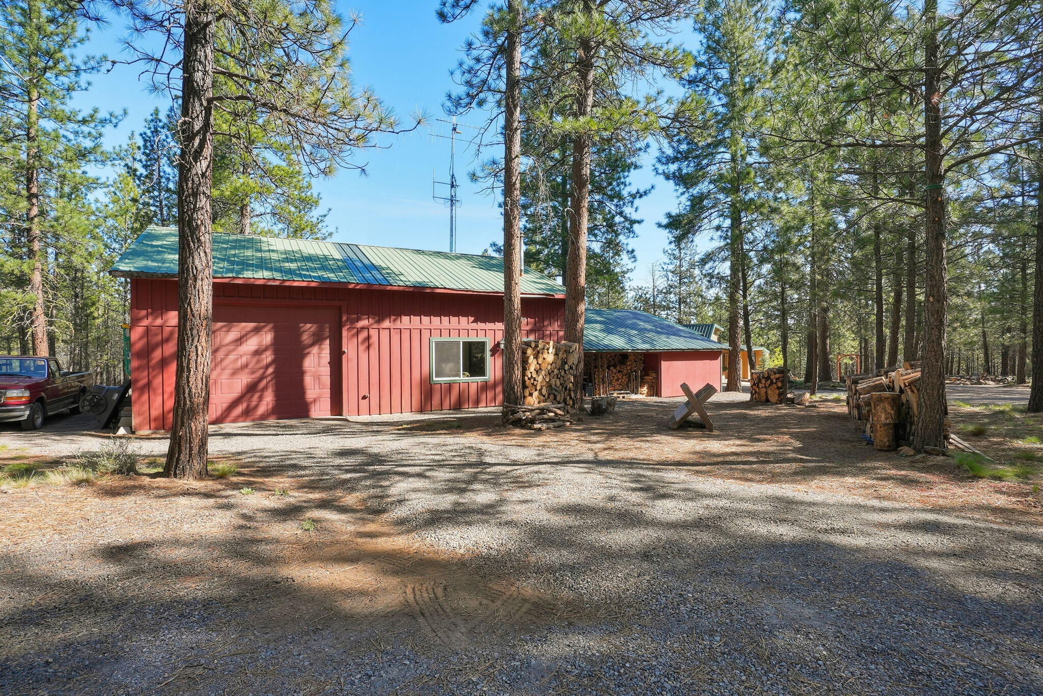 15020 Remuda Road Sisters, OR 97759 - Photo 41 of 61 28'x30' shop includes 28'x16' RV bay with 9'10" x 11'10" roll up door plus two additional 22'x14' rooms