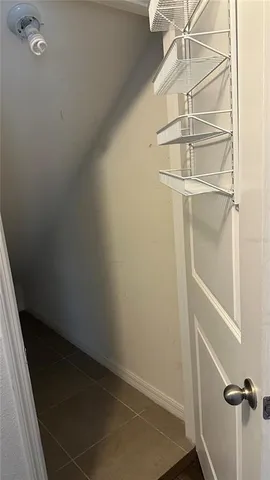 a view of a room with rack on the wall