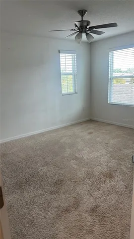 a view of house with outdoor space and sitting area