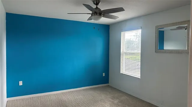 a view of a house with a street