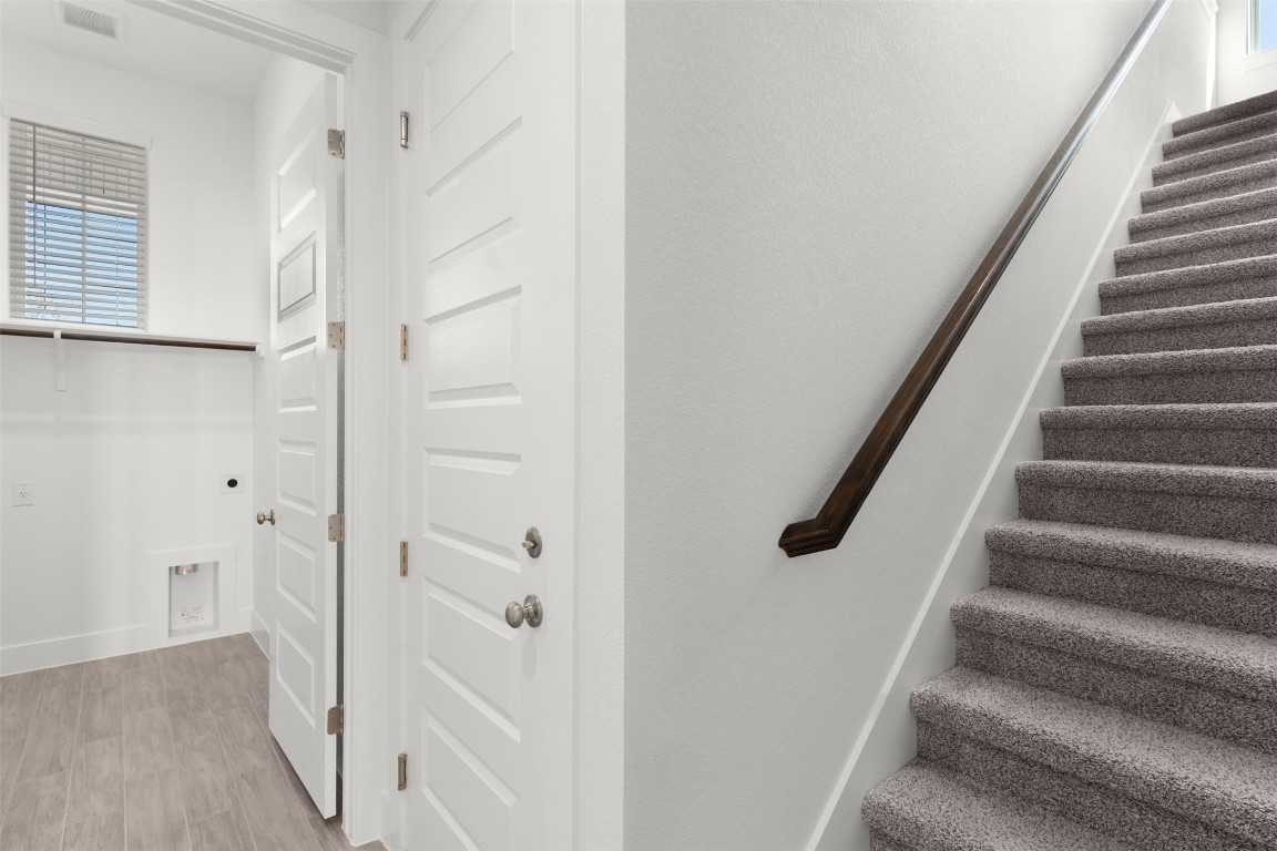 333 Ridgewell Loop Georgetown, TX 78633 - Photo 17 of 29 Staircase featuring wood finished floors