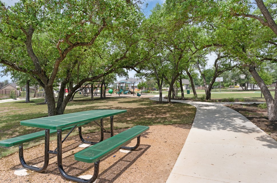 333 Ridgewell Loop Georgetown, TX 78633 - Photo 28 of 29 View of home's community featuring a lawn