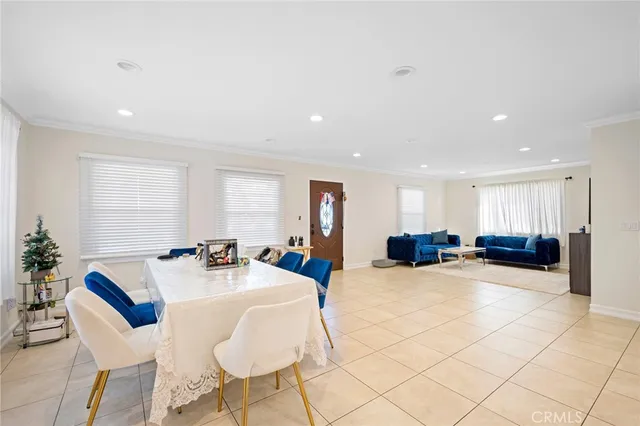 a kitchen with cabinets and stainless steel appliances