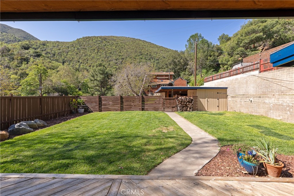 31311 Silverado Canyon Road Silverado, CA 92676 - Photo 13 of 37 a view of a backyard with sitting area