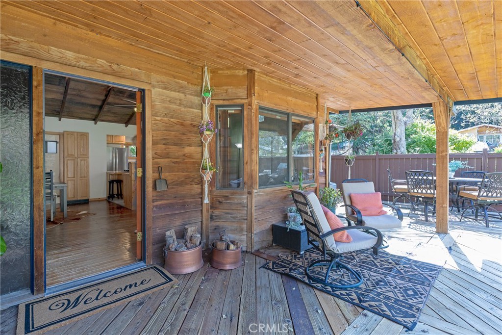 31311 Silverado Canyon Road Silverado, CA 92676 - Photo 15 of 37 a outdoor space with patio the couches and a dining table with garden view